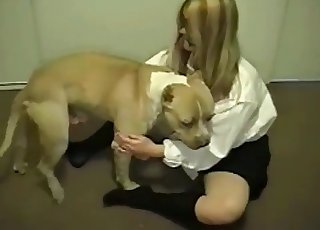 Blond-haired chick fucked by a dog
