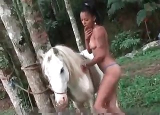 Slim zoophilic slut with a sexy horse