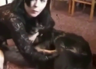 Brunette wants her dog to fuck her mouth