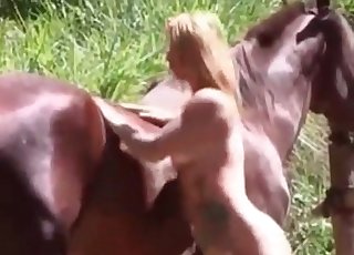 Incredible blonde slut really loves having sex with a brown stallion