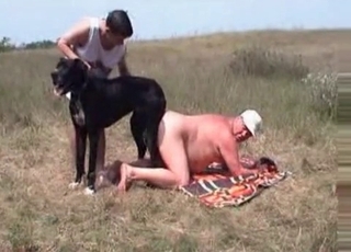 Two dudes are having a steamy threesome fun with a dog