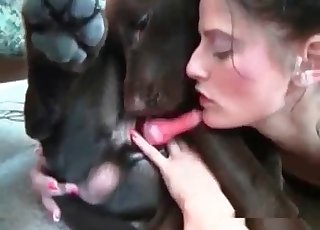 The cute dick of a dog gets deepthroated by a horny brunette